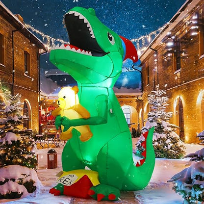 GOOSH 7 FT Christmas Inflatables Dinosaur Outdoor Decorations Blow Up Yard T Rex with Xmas Hat Holding a Bear with Built-in LEDs for Garden Lawn Indoor Party Décor